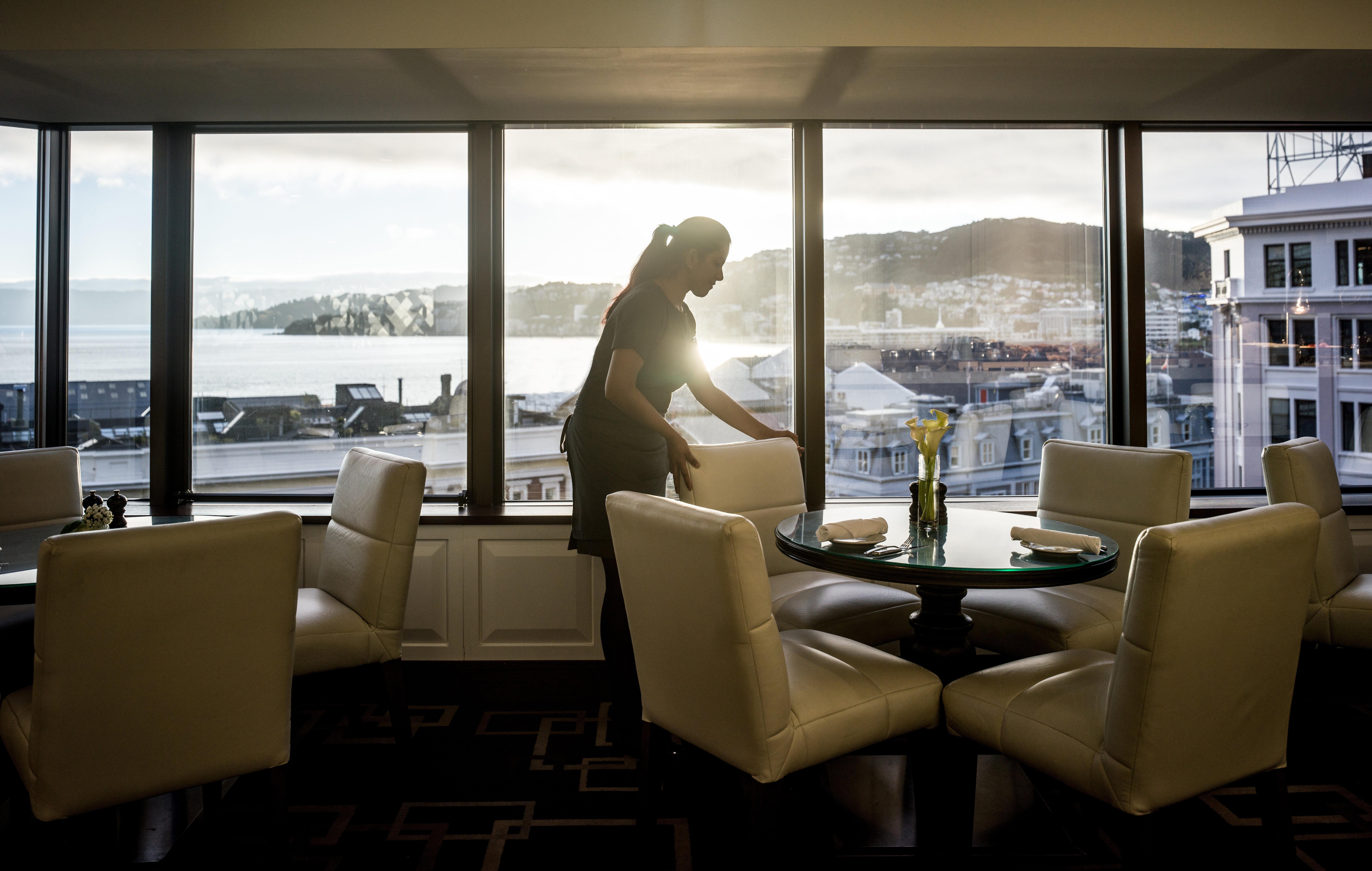 Intercontinental Wellington By Ihg Hotel Luaran gambar A hotel maid polishing a chair